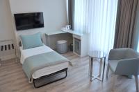 TV a/nebo společenská místnost v ubytování Centrum Suites İstanbul