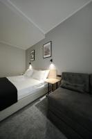 Posteľ alebo postele v izbe v ubytovaní Teatro Verdi Boutique Hotel