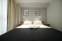 Posteľ alebo postele v izbe v ubytovaní Teatro Verdi Boutique Hotel
