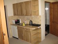 Kuchyň nebo kuchyňský kout v ubytování Apartmány U Vlka