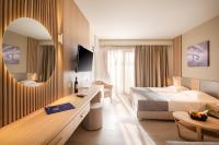 Televízia a/alebo spoločenská miestnosť v ubytovaní Horizon Beach Resort