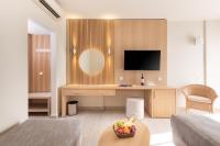 Televízia a/alebo spoločenská miestnosť v ubytovaní Horizon Beach Resort