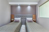 Posteľ alebo postele v izbe v ubytovaní Anna Hotel
