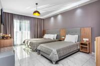 Posteľ alebo postele v izbe v ubytovaní Anna Hotel