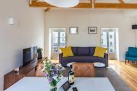 TV a/nebo společenská místnost v ubytování Amazing Penthouse Apartment in historic Porto