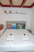 Posteľ alebo postele v izbe v ubytovaní Eden Rooms