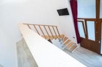 Televízia a/alebo spoločenská miestnosť v ubytovaní Eden Rooms