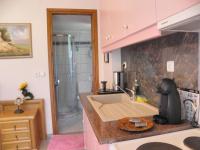 Kuchyňa alebo kuchynka v ubytovaní Irida Beach Resort Suites