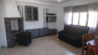 Posezení v ubytování Vivienda vacacional "Beniarda"