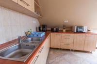 A kitchen or kitchenette at Erika Vendégház