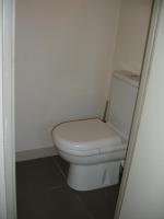a bathroom with a white toilet in a room at Studio Centre Ville Office De Tourisme in Bayonne