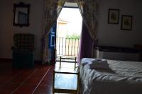 A bed or beds in a room at Amanecer en Campos