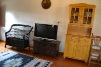 A television and/or entertainment centre at Amanecer en Campos