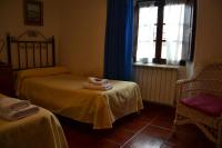 A bed or beds in a room at Amanecer en Campos