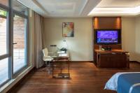 TV a/nebo společenská místnost v ubytování Yushan Town Tianji Cloud Business Hotel