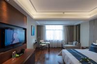 TV a/nebo společenská místnost v ubytování Yushan Town Tianji Cloud Business Hotel
