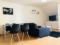 Televízia a/alebo spoločenská miestnosť v ubytovaní Apartment Melody