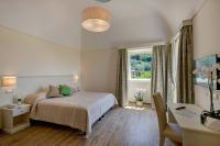 A bed or beds in a room at Agriturismo La Peppina