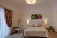 A bed or beds in a room at Agriturismo La Peppina