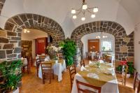 A restaurant or other place to eat at Agriturismo La Peppina