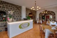 A restaurant or other place to eat at Agriturismo La Peppina