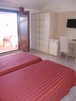 A bed or beds in a room at B&B Il Girasole