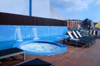 a hot tub on the roof of a building at Axel Hotel Barcelona - Adults Only in Barcelona