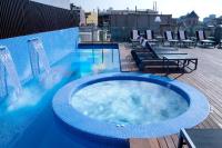 a hot tub on the roof of a building at Axel Hotel Barcelona - Adults Only in Barcelona