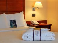 Posteľ alebo postele v izbe v ubytovaní Mercure Leonardo da Vinci Rome Airport