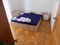 Posteľ alebo postele v izbe v ubytovaní Apartment Leporiz
