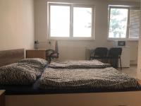 Posteľ alebo postele v izbe v ubytovaní Moonstreet apartments