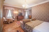 Łóżko lub łóżka w pokoju w obiekcie Hotel Villa Condulmer