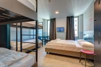 A bed or beds in a room at MEININGER Milano Lambrate