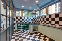 A kitchen or kitchenette at MEININGER Milano Lambrate