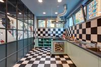 A kitchen or kitchenette at MEININGER Milano Lambrate