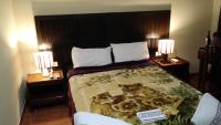 Residencia Leones de Castillaにあるベッド