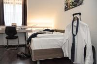 Hotel Alexander Zurich Old Townにあるベッド