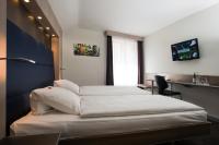 Hotel Alexander Zurich Old Townにあるベッド