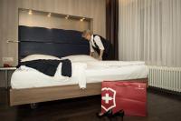 Hotel Alexander Zurich Old Townにあるベッド