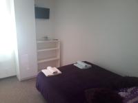 Postel nebo postele na pokoji v ubytování Apartmány Karlštejn
