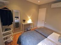Posteľ alebo postele v izbe v ubytovaní 555 Apartments BCN