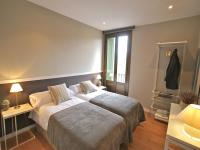 Posteľ alebo postele v izbe v ubytovaní 555 Apartments BCN