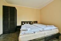 Postel nebo postele na pokoji v ubytování Wellness Hotel Fridrich