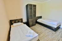 Postel nebo postele na pokoji v ubytování Wellness Hotel Fridrich