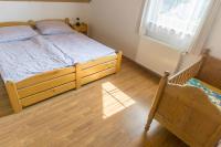 Postel nebo postele na pokoji v ubytování Holiday Villa Javornik