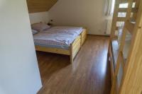 Postel nebo postele na pokoji v ubytování Holiday Villa Javornik