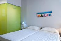 Postel nebo postele na pokoji v ubytování Magia Apartments