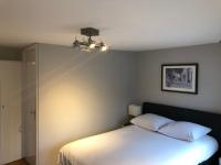 Ein Bett oder Betten in einem Zimmer der Unterkunft Bridge Inn