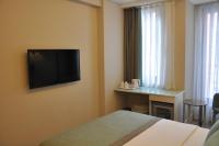 TV a/nebo společenská místnost v ubytování Centrum Suites İstanbul