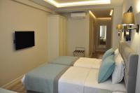TV a/nebo společenská místnost v ubytování Centrum Suites İstanbul